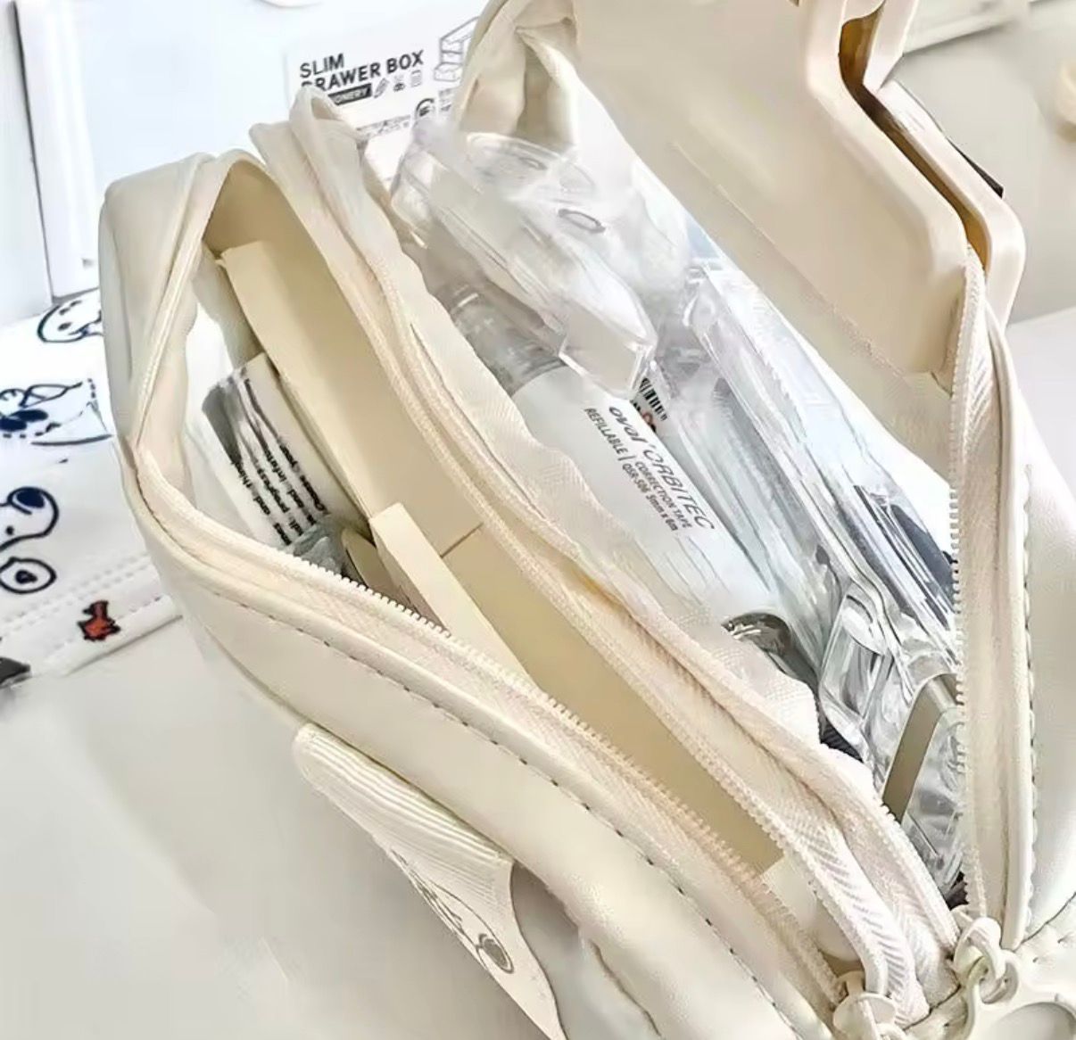 Estuche Snoopy transparente