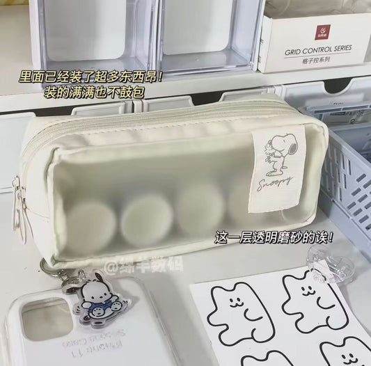 Estuche Snoopy transparente